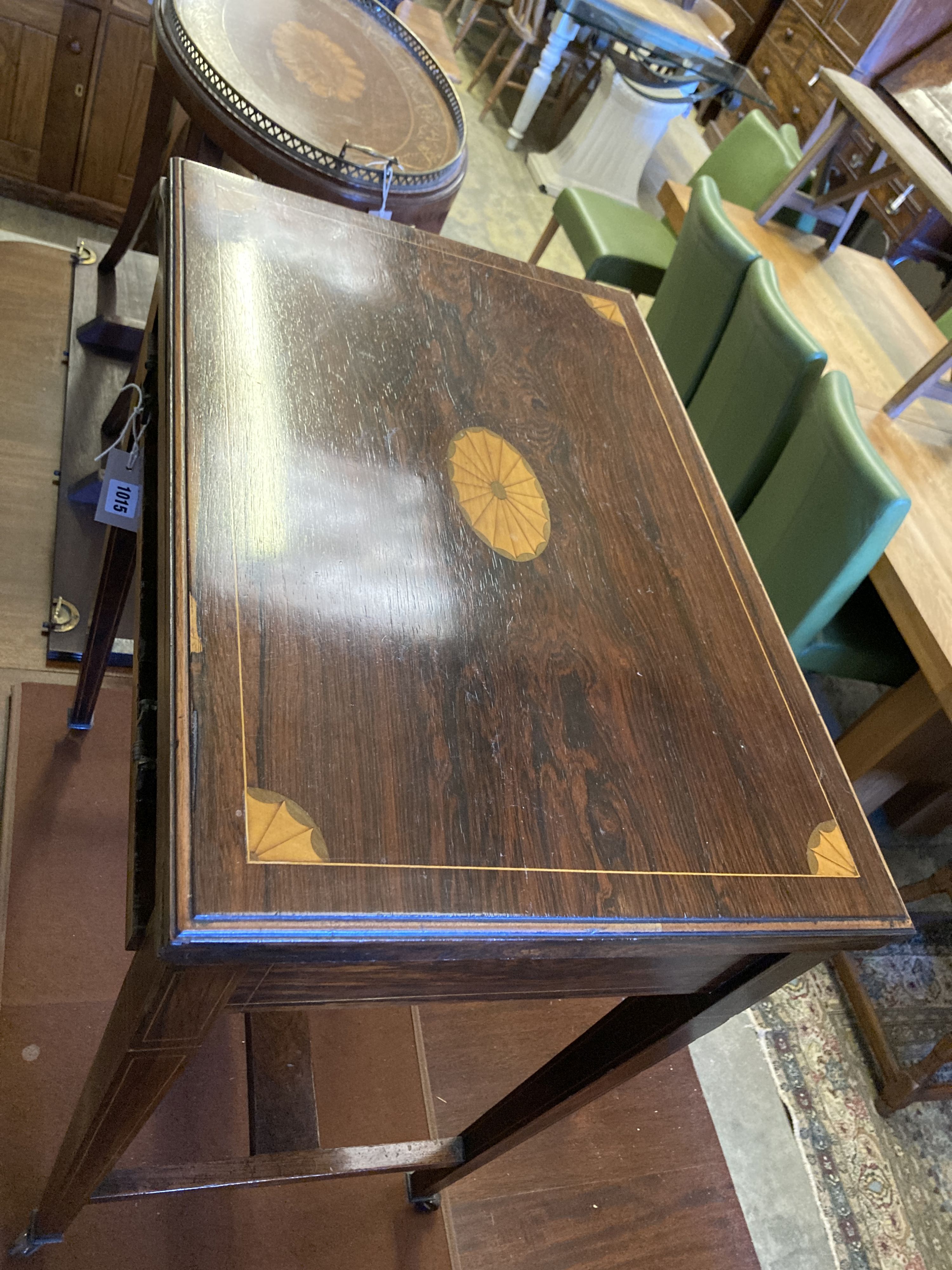 A late Victorian inlaid rosewood games table, width 55cm, depth 40cm, height 71cm